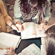 Ladies praying together